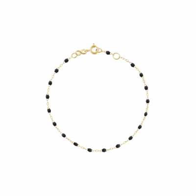 Gigi Clozeau Classic Gigi Bracelet in 18k yellow gold features sleek black resin beads.