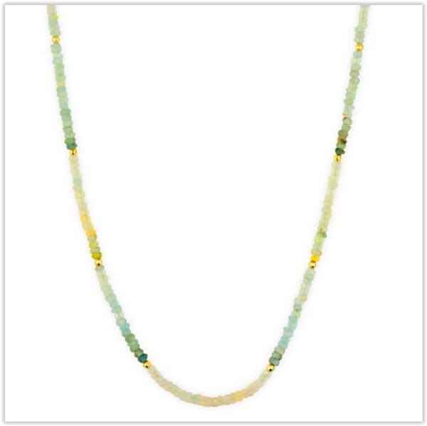 Three stories of beautifully graduated ombré morganite and aquamarine beads create a necklace of exceptional elegance and charm. This 18-inch layered design blends soft blush pink and tranquil blue tones along delicate chains, offering effortless sophistication. Feminine, refined, and versatile, it brings a touch of luxury and graceful color to any look.